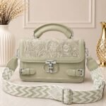 A subtle, earthy pastel tone that adds an understated, refreshing touch to any look