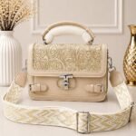 Ultra-sophisticated, minimalist, and luxury-inspired, featuring a cream-and-tan jacquard strap