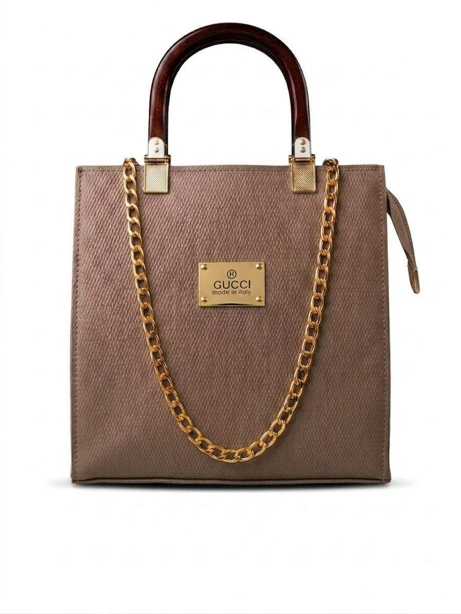 Taupe satchel bag with wooden top handles and gold chain strap