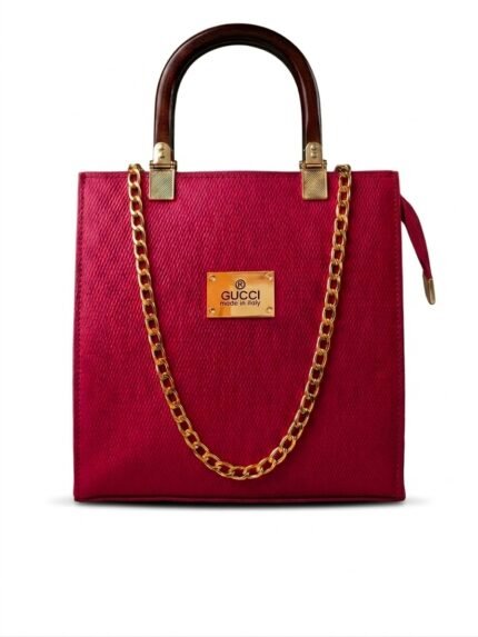 Crimson red Saffiano leather structured satchel handbag with wooden top handle.