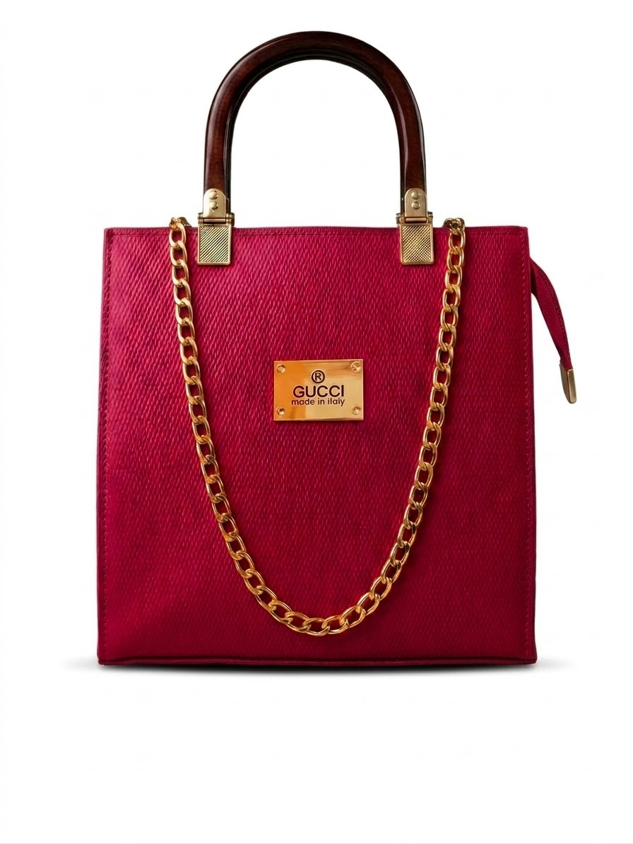 Crimson red Saffiano leather structured satchel handbag with wooden top handle.