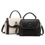 FOXJAZZ top-handle croco embossed handbags displayed side by side in off-white and classic black.