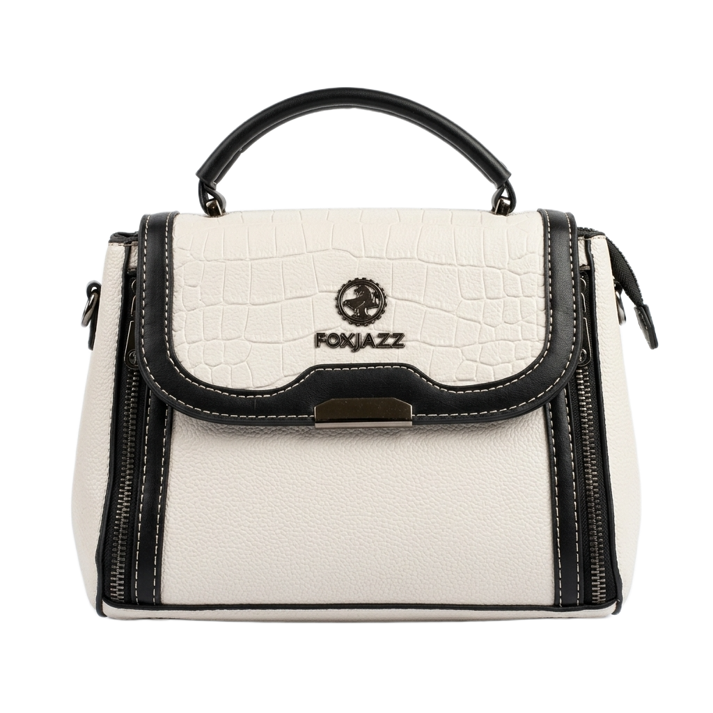 FOXJAZZ Off-White Croc Flap Satchel Front View Front studio shot of off-white FOXJAZZ crocodile-embossed flap satchel bag featuring metallic logo emblem and side zippers.