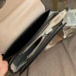 Top view looking into the open CIEICI handbag showing multiple inner compartments and central zipper divider pocket.