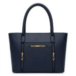 Front view of a navy blue multi-compartment tote bag with gold-tone accents on a pure white background.