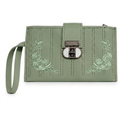 A pale sage-green women's faux leather long wallet or wristlet clutch. It features distinctive vertical stitching columns and symmetrical corner floral patterns of intricate light-green thread roses and tendrils. The central locking mechanism is a distinctive, dark metallic mechanical turn-lock with a unique white porcelain-like insert. A green wristlet strap is attached to the left.